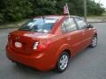 Tropical Red - Rio LX Sedan Photo No. 3
