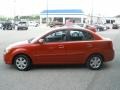 Tropical Red - Rio LX Sedan Photo No. 6