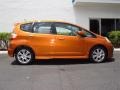 2011 Orange Revolution Metallic Honda Fit Sport  photo #2