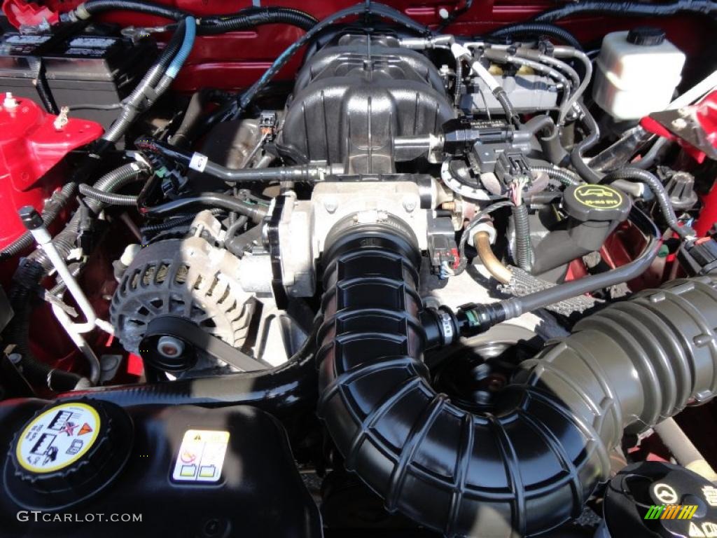 2006 Mustang V6 Premium Coupe - Redfire Metallic / Light Parchment photo #22