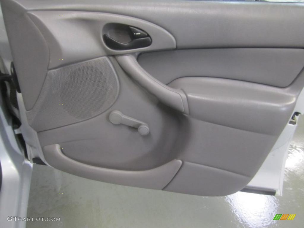 2003 Ford Focus LX Sedan Medium Graphite Door Panel Photo #49497354