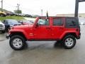 2010 Flame Red Jeep Wrangler Unlimited Sahara 4x4  photo #2