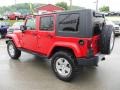 2010 Flame Red Jeep Wrangler Unlimited Sahara 4x4  photo #3