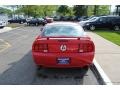 2005 Torch Red Ford Mustang V6 Deluxe Coupe  photo #8