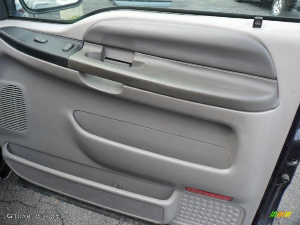 1999 Ford F250 Super Duty XLT Extended Cab 4x4 Medium Graphite Door Panel Photo #49542173