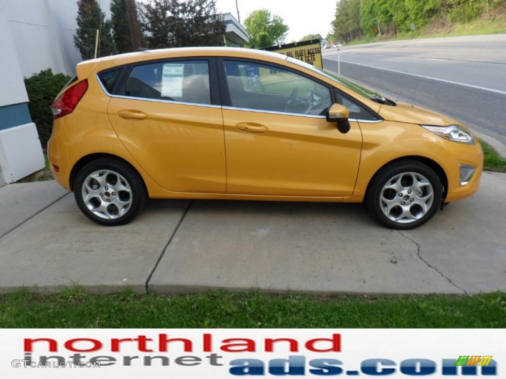 2011 Fiesta SES Hatchback - Yellow Blaze Metallic Tri-Coat / Charcoal Black/Blue Cloth photo #1