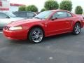 1999 Rio Red Ford Mustang V6 Coupe  photo #6
