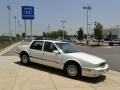 1990 White Diamond Cadillac Seville STS  photo #3
