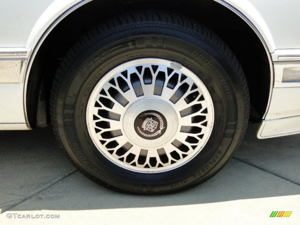 1990 Cadillac Seville STS Wheel Photo #49647872