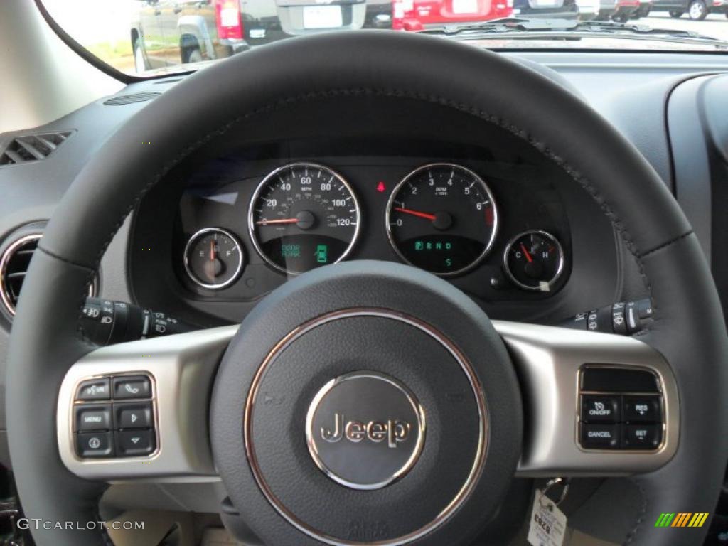 2011 Jeep Patriot Latitude X 4x4 Dark Slate Gray/Light Pebble Steering Wheel Photo #49653501