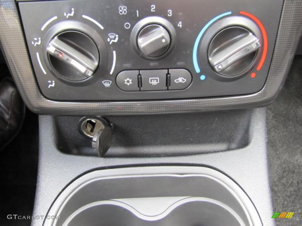 2009 G5  - Performance Red Tintcoat / Ebony photo #12