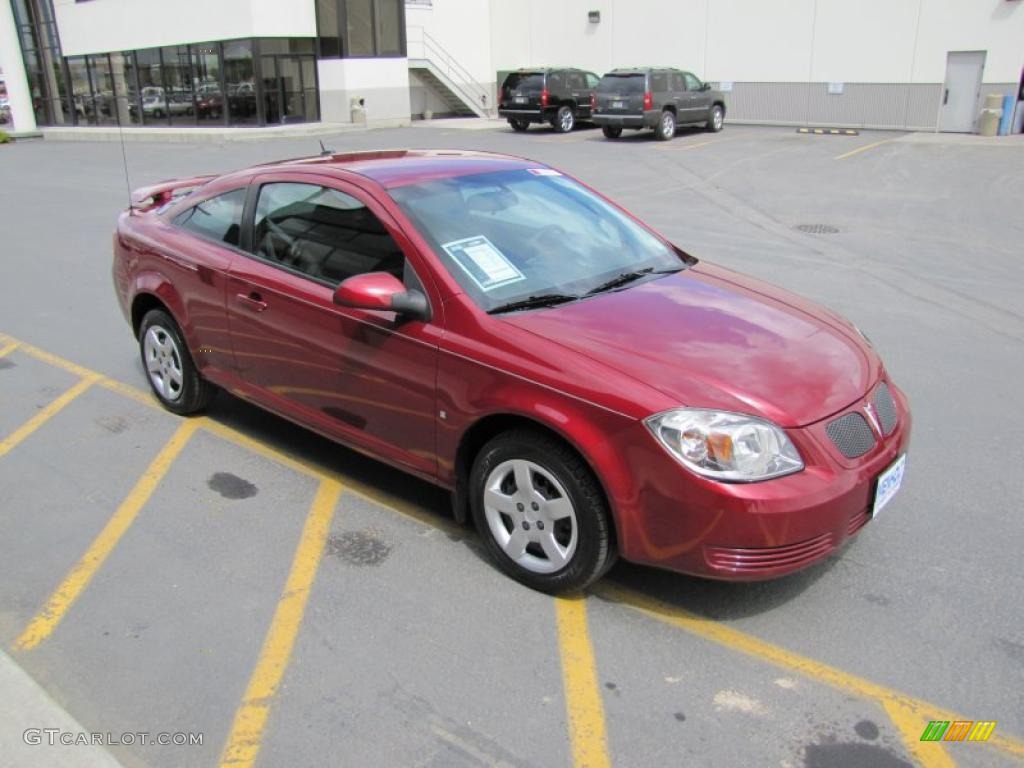 2009 G5  - Performance Red Tintcoat / Ebony photo #26