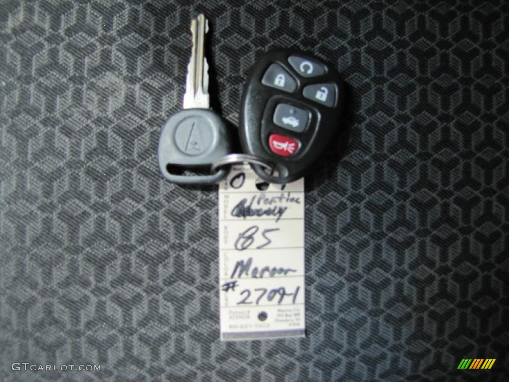 2009 G5  - Performance Red Tintcoat / Ebony photo #30