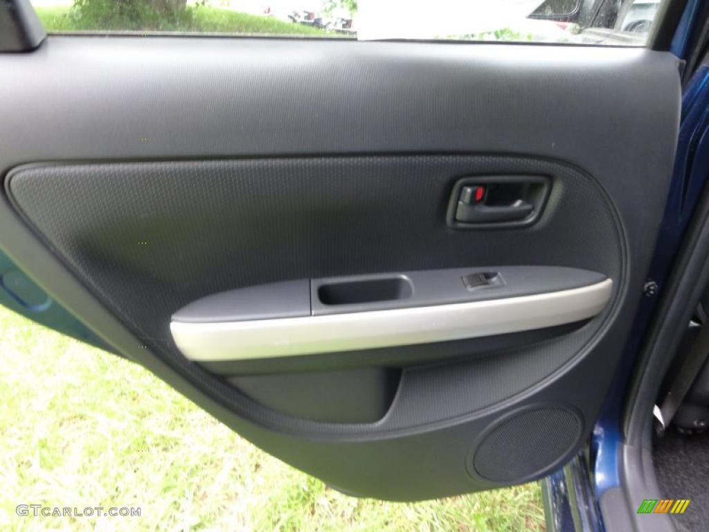 2006 Scion xA Standard xA Model Dark Charcoal Door Panel Photo #49708754