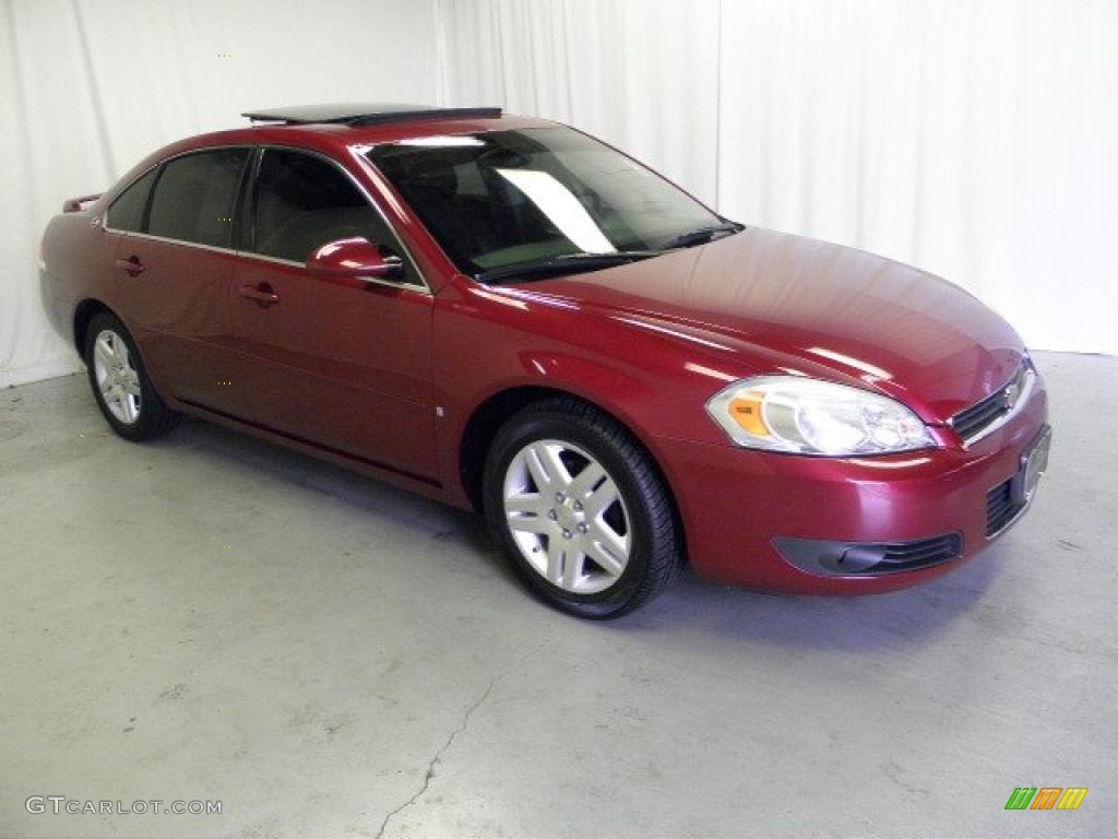 2006 Impala LTZ - Sport Red Metallic / Ebony Black photo #1