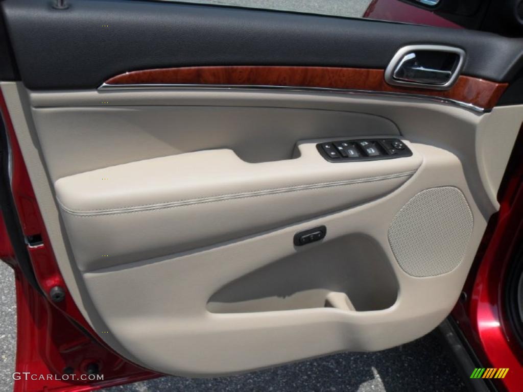 2011 Jeep Grand Cherokee Limited Black/Light Frost Beige Door Panel Photo #49744252