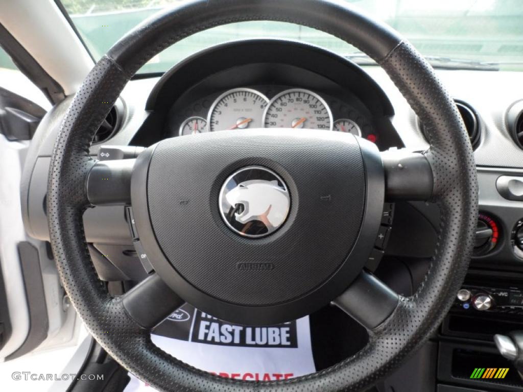 2002 Mercury Cougar V6 Coupe Midnight Black Steering Wheel Photo #49770730