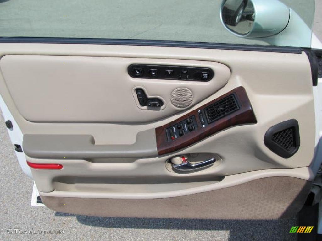 1999 Oldsmobile Aurora Standard Aurora Model Tan Door Panel Photo #49772554