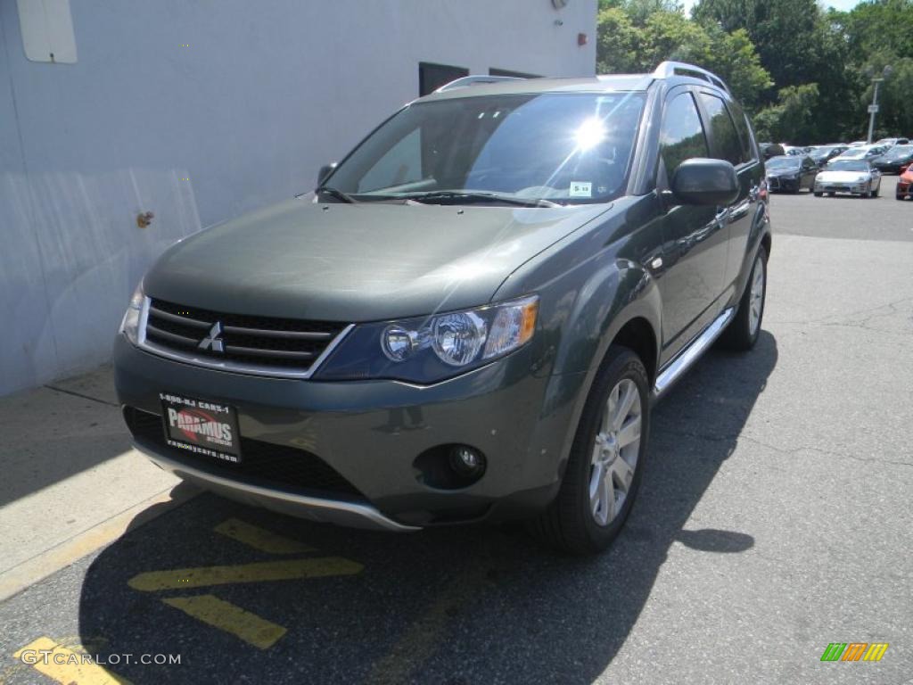 2008 Outlander SE 4WD - Manitoba Green Metallic / Black photo #1