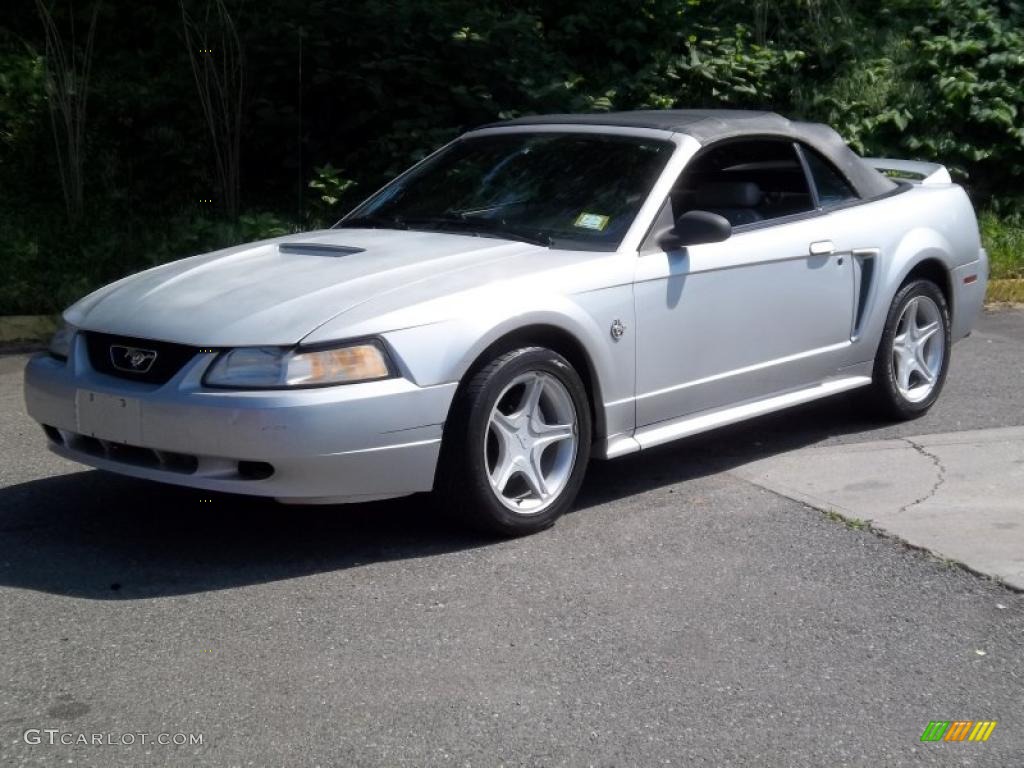 Silver Metallic 1999 Ford Mustang V6 Convertible Exterior Photo #49792586