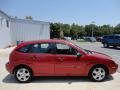 2005 Sangria Red Metallic Ford Focus ZX5 SES Hatchback  photo #12