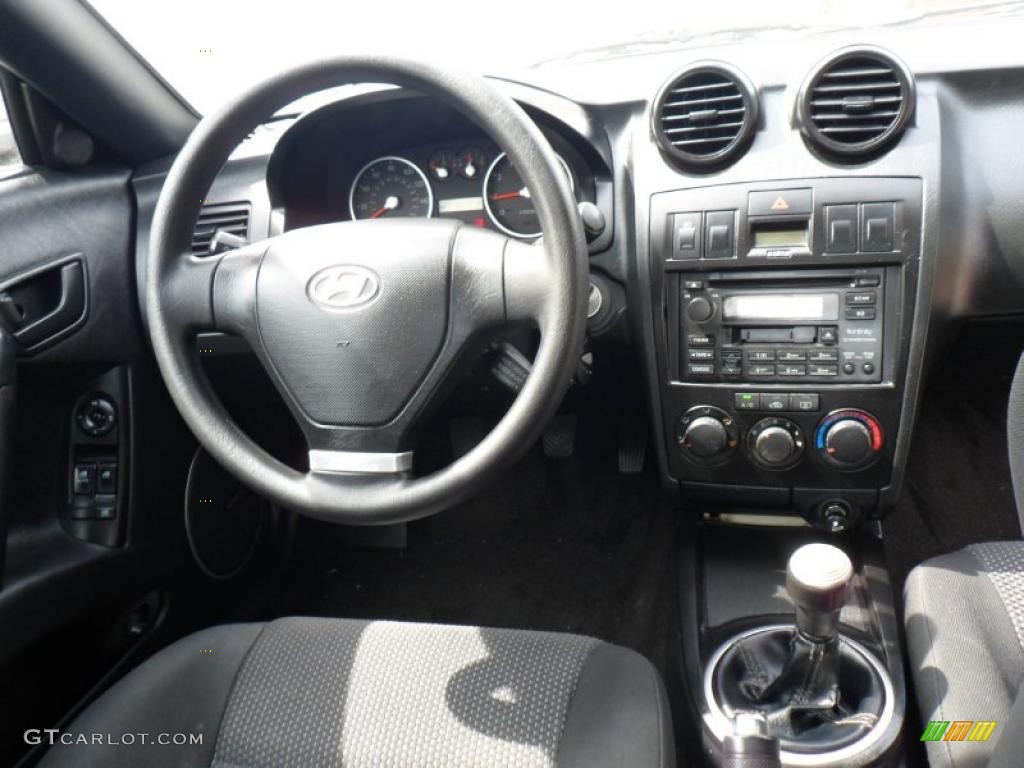 2003 Hyundai Tiburon Standard Tiburon Model Black Dashboard Photo #49827300