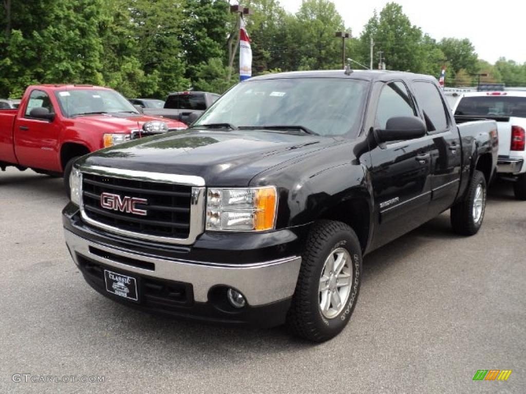 2011 Sierra 1500 SLE Crew Cab 4x4 - Storm Gray Metallic / Ebony photo #1