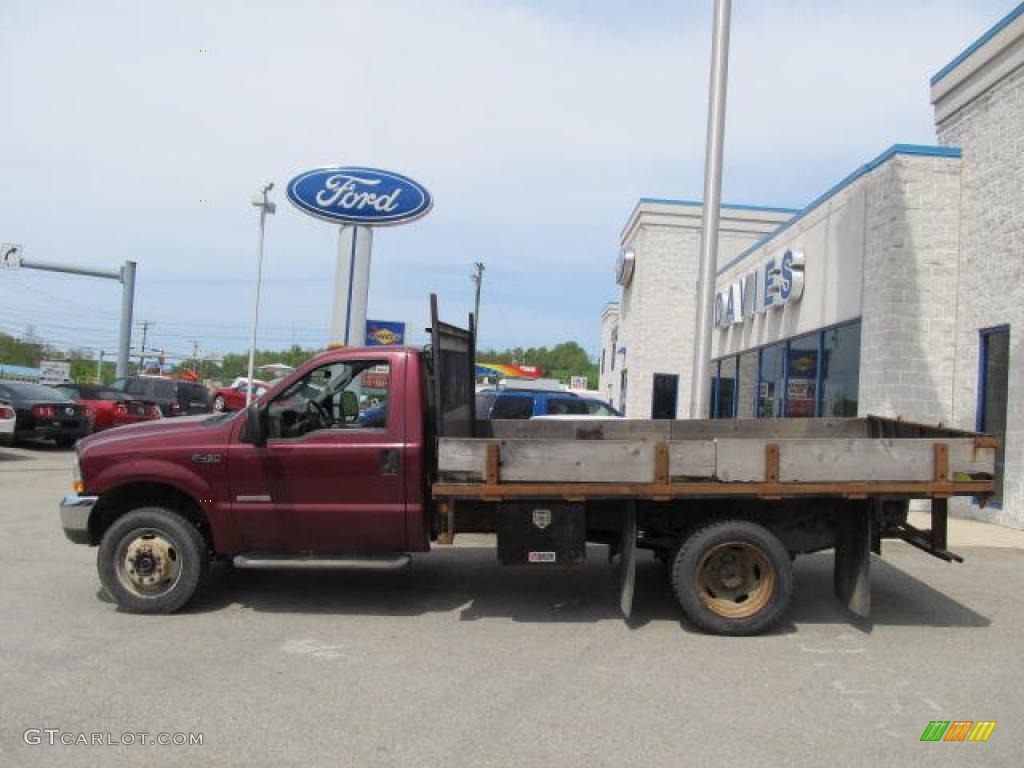 2004 F450 Super Duty XL Regular Cab 4x4 Chassis Stake Truck - Dark Toreador Red Metallic / Medium Flint photo #2