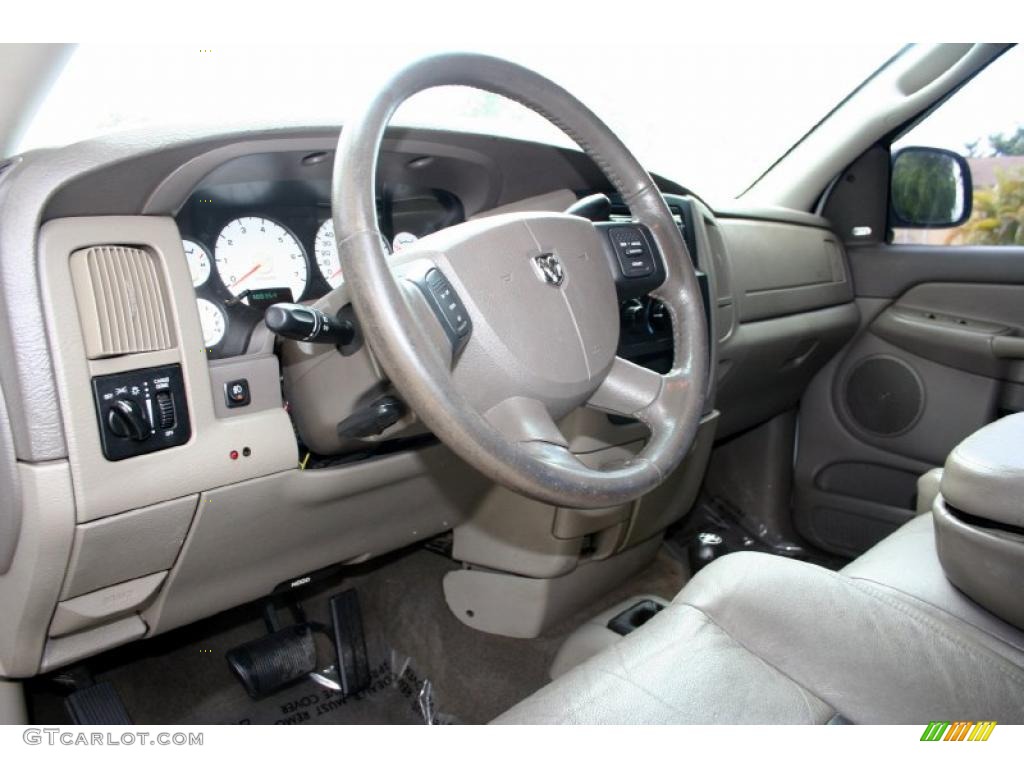 2004 Ram 1500 SLT Quad Cab 4x4 - Bright White / Taupe photo #55