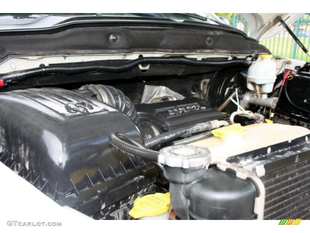 2004 Ram 1500 SLT Quad Cab 4x4 - Bright White / Taupe photo #79