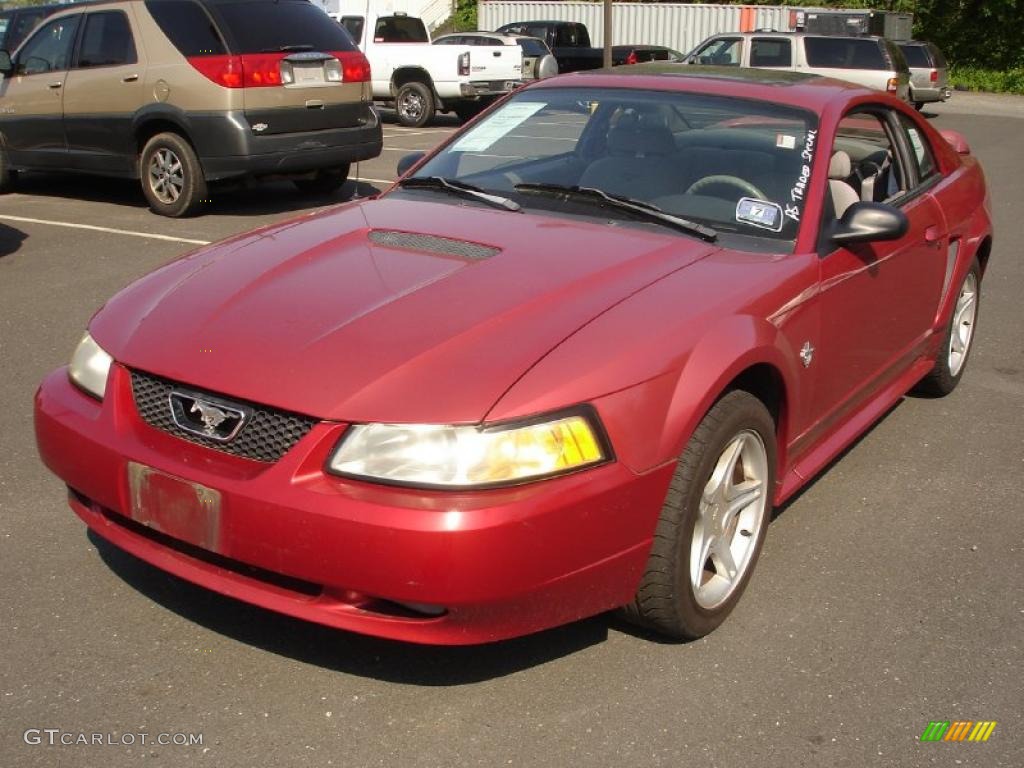 1999 Mustang V6 Coupe - Laser Red Metallic / Light Graphite photo #1