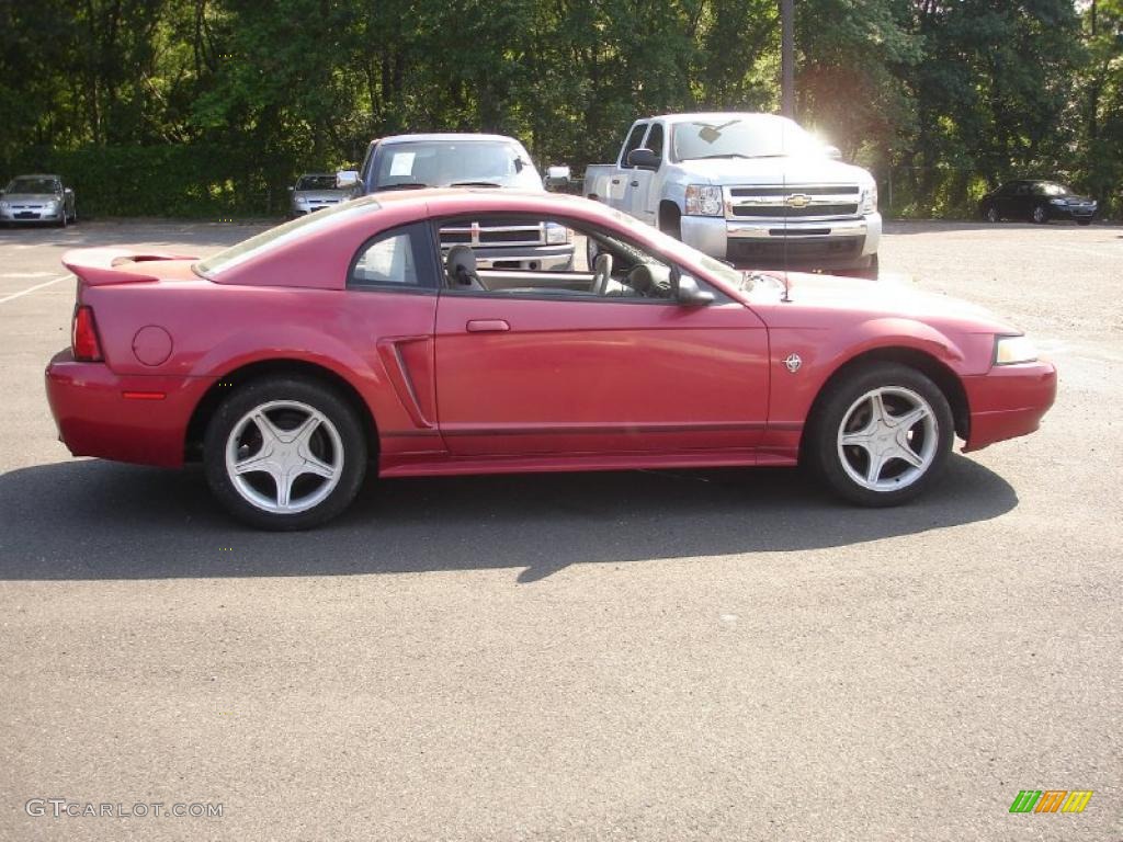 Laser Red Metallic 1999 Ford Mustang V6 Coupe Exterior Photo #49874588