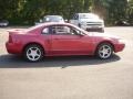 Laser Red Metallic 1999 Ford Mustang V6 Coupe Exterior