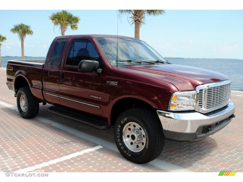 Dark Toreador Red Metallic 1999 Ford F350 Super Duty XLT SuperCab 4x4 Exterior Photo #49876034