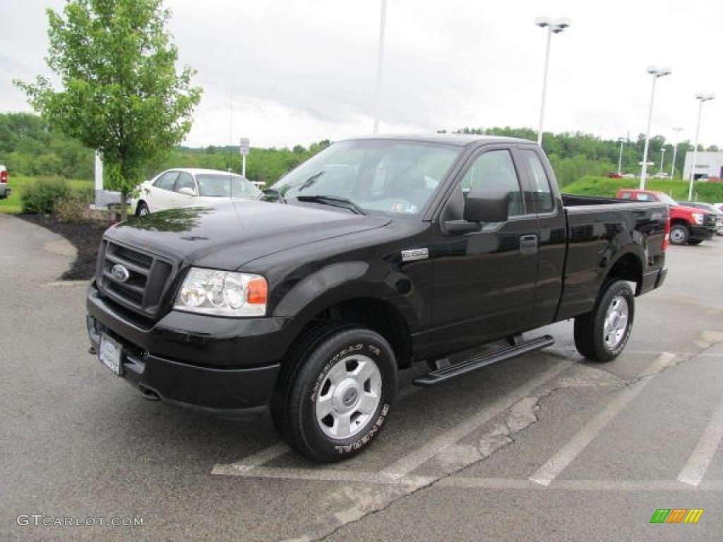 Black 2004 Ford F150 STX Regular Cab 4x4 Exterior Photo #49879796