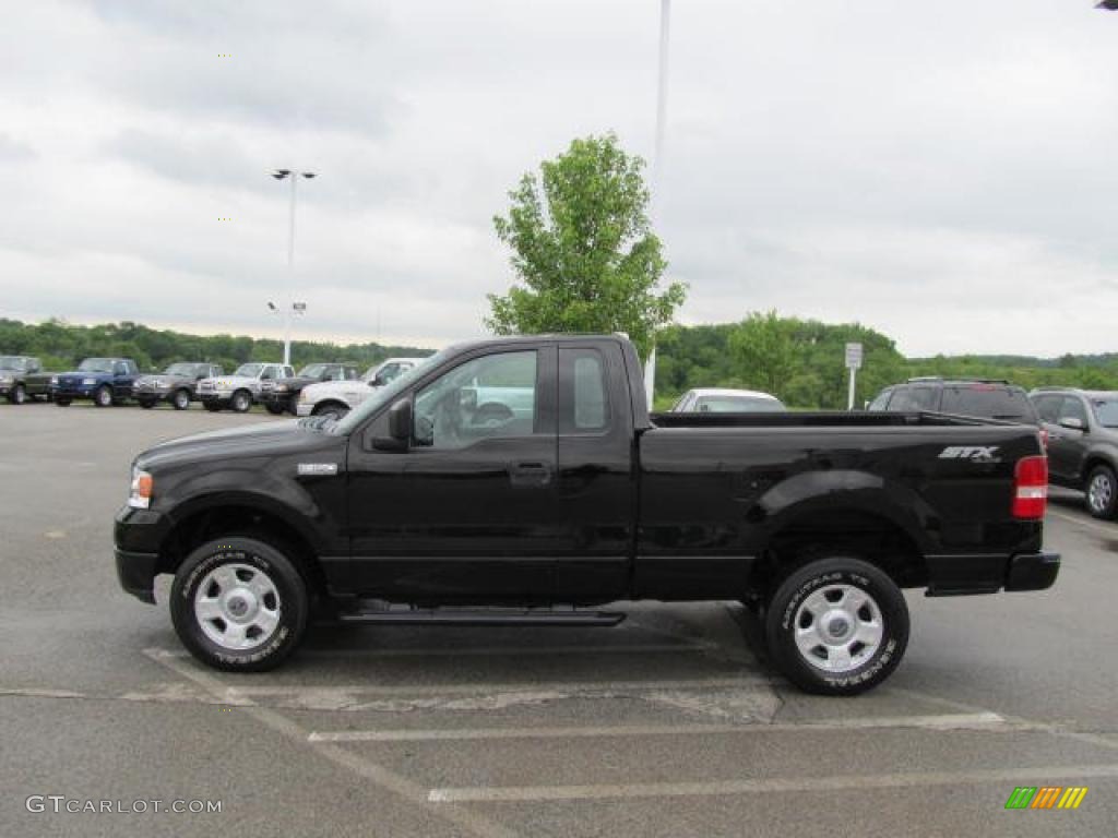 Black 2004 Ford F150 STX Regular Cab 4x4 Exterior Photo #49879814