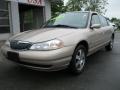 Light Prairie Tan Metallic 1999 Mercury Mystique LS