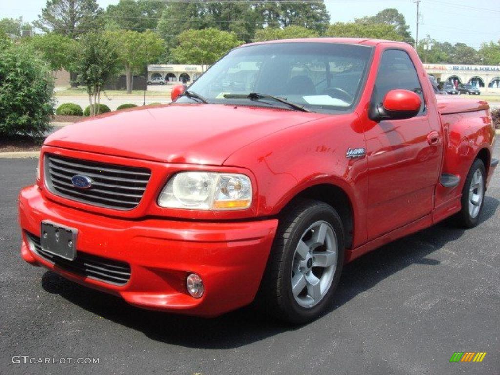 Bright Red 2001 Ford F150 SVT Lightning Exterior Photo #49889381