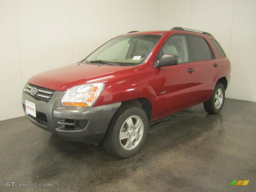 2007 Sportage LX 4WD - Volcanic Red / Beige photo #1