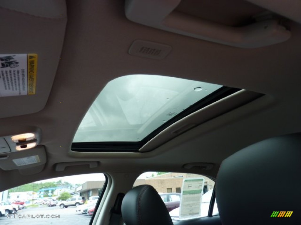 2011 Fusion Sport - Tuxedo Black Metallic / Sport Red/Charcoal Black photo #12