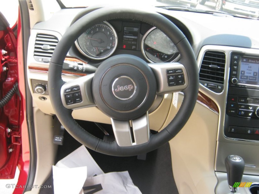 2011 Jeep Grand Cherokee Limited Black/Light Frost Beige Steering Wheel Photo #49941029