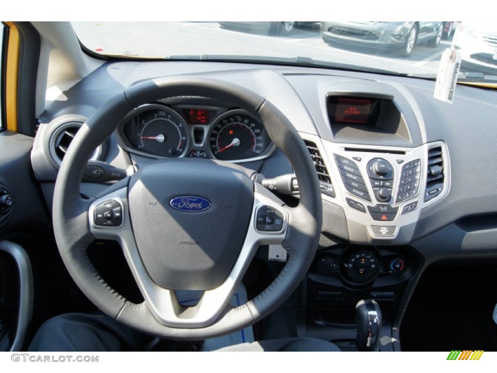 2011 Ford Fiesta SES Hatchback Charcoal Black/Blue Cloth Steering Wheel Photo #49968585
