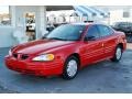 2000 Bright Red Pontiac Grand Am SE Sedan  photo #1