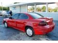 2000 Bright Red Pontiac Grand Am SE Sedan  photo #9