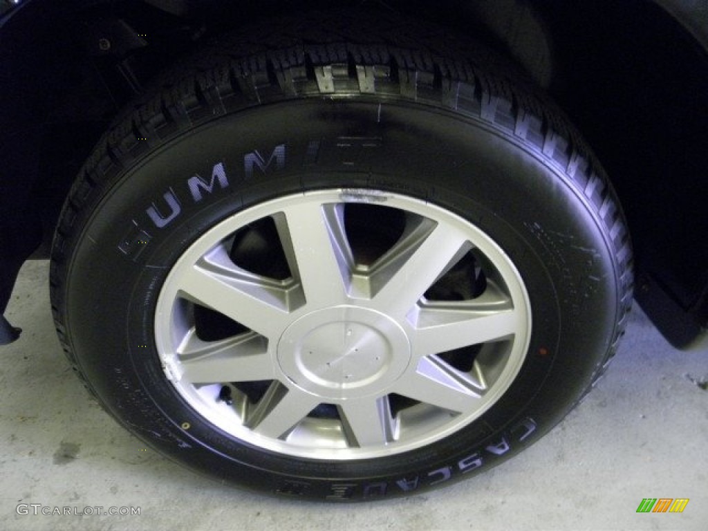 2004 Rainier CXL AWD - Black / Light Cashmere photo #13