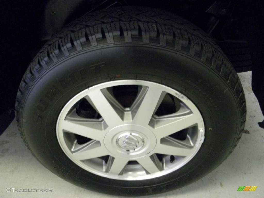 2004 Rainier CXL AWD - Black / Light Cashmere photo #14