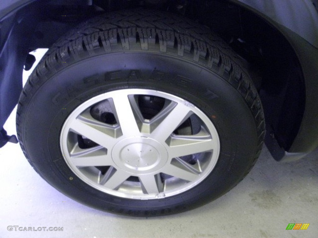 2004 Rainier CXL AWD - Black / Light Cashmere photo #27