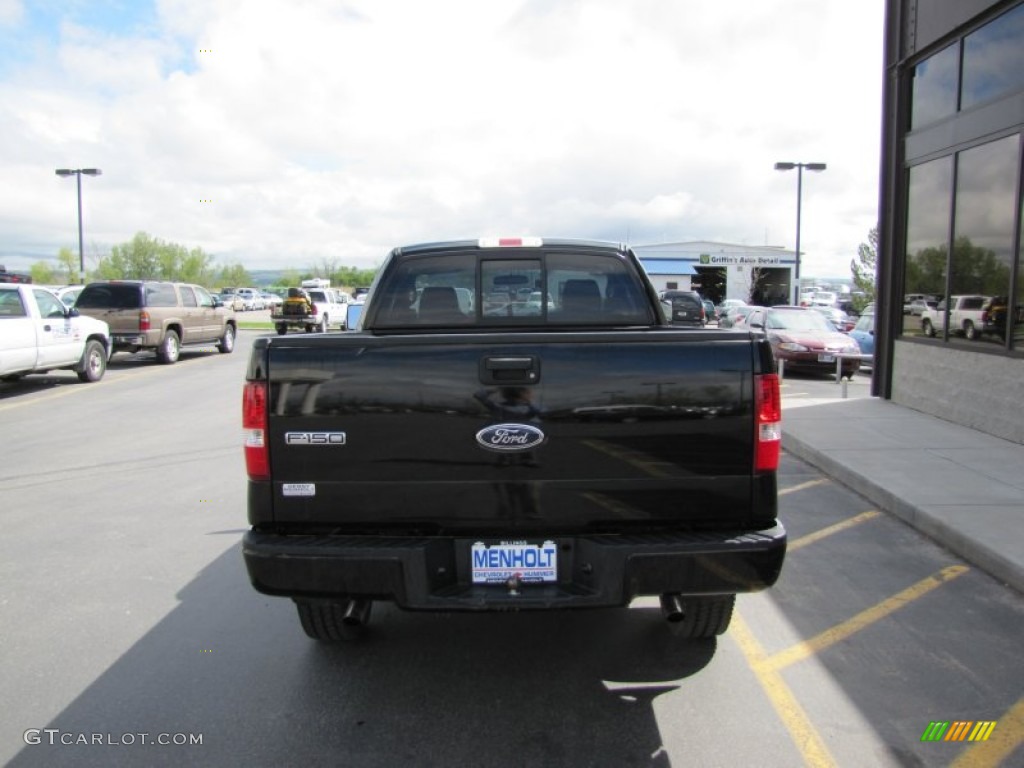 2004 F150 STX Regular Cab 4x4 - Black / Medium Graphite photo #23