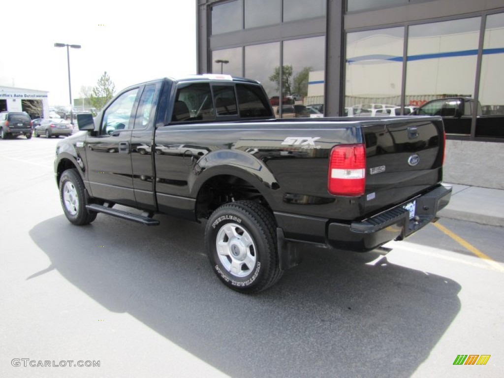 2004 F150 STX Regular Cab 4x4 - Black / Medium Graphite photo #24