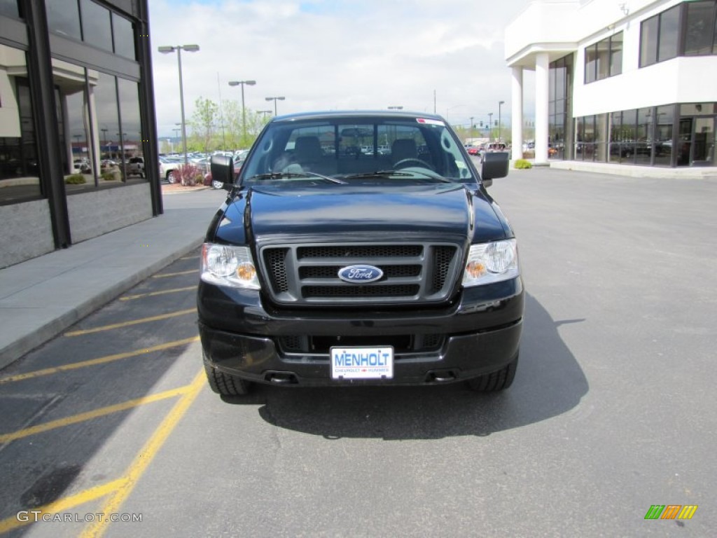 2004 F150 STX Regular Cab 4x4 - Black / Medium Graphite photo #26